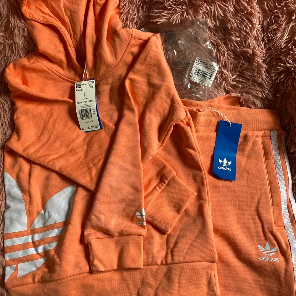 Juniors Adidas track suit 7/8Y coral/orange